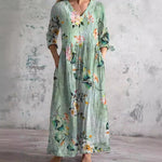 Încarcă imaginea în vizualizatorul Galerie, Rochie lungă de damă cu imprimeu floral, cu decolteu în V și mâneci trei sferturi
